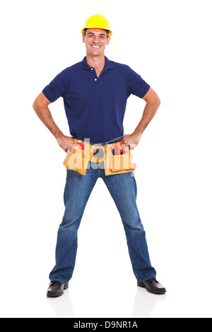 handsome handyman wearing tool helmet over white background Stock Photo