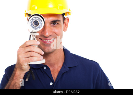 fun cctv installer looking through cctv camera over white background Stock Photo