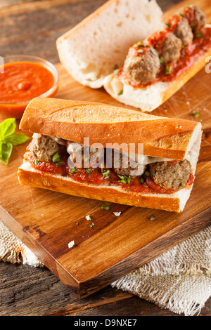 Homemade Spicy Meatball Sub Sandwich with Marinara Sauce and Cheese Stock Photo