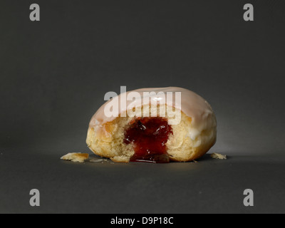 Half eaten doughnut Stock Photo