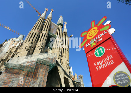 Barcelona City Tour sightseeing bus stop sign for tourists at the Basilica de la Sagrada Familia cathedral in Barcelona, Spain Stock Photo