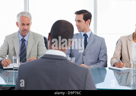 Business people asking questions during a job interview Stock Photo