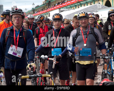 Cyclists who have completed the London to Brighton Cycle Rally Stock Photo