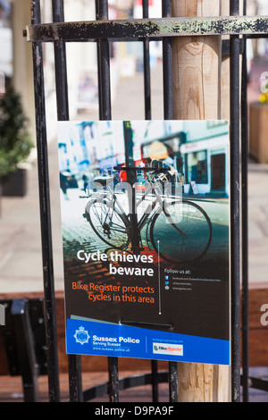 Bicycle With A Police Warning Thieves Beware Sign Attached Stock Photo