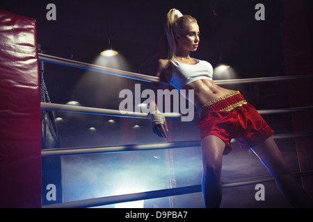 Young female boxer prepare to first fight Stock Photo