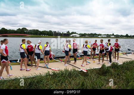 Eton Dorney, UK. 23 June 2013. The British rowing 8 and the Polish rowing 8 congratulate each other after the final of the 8s at the 2013 Samsung World Rowing Cup on Eton Dorney lake, Sunday 23 June 2013. Credit:  Lovelylight/Alamy Live News
