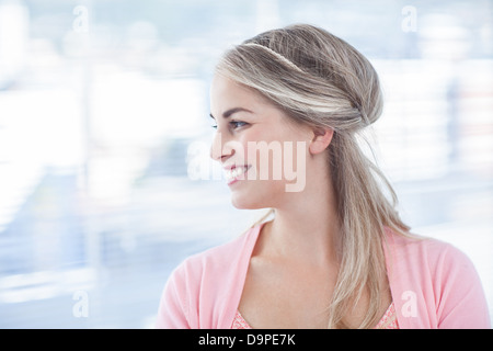 Pretty blonde woman standing in her office Stock Photo