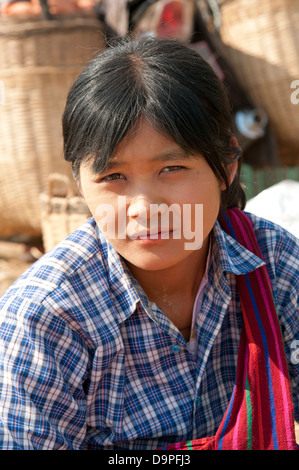 Pretty Burmese girl looking at the camera poses for a portrait Inle lake market Myanmar (Burma) Stock Photo