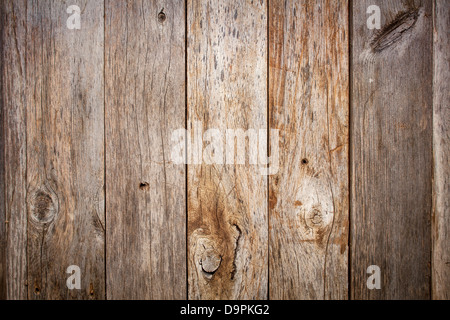 grunge weathered barn wood background with knots and nail holes Stock Photo