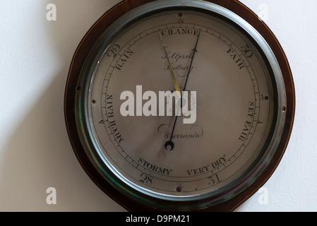 A wheel barometer showing change Stock Photo