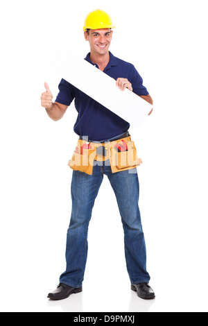 happy young carpenter giving thumb up isolated on white Stock Photo