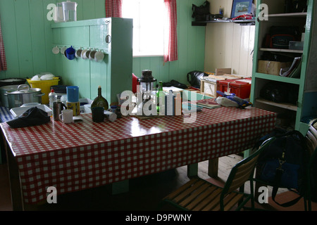 Eating area display at the Port Lockroy museum, Antarctica Stock Photo
