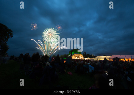 Evening view of the Cholmondeley fireworks concert in the grounds of Cholmondeley Castle. Stock Photo