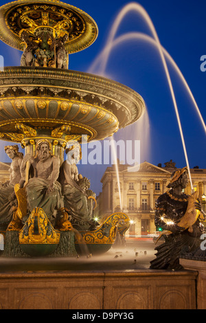 Twilight at Fontaine des Fleuves - Fountain of Rivers at Place de la Concorde, Paris France Stock Photo