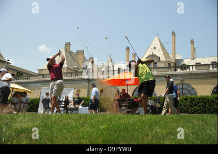 Huntington, N.Y, U.S. June 24, 2013.  Former San Francisco 49ers great Ronnie Lott hits a golf ball on the driving range at Oheka Castle for the second annual Big Daddy Celebrity Golf Classic at Cold Spring Country Club in Huntington, N.Y. Credit:  Cal Sport Media/Alamy Live News Stock Photo