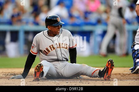 Los Angeles, CA. USA. June 24, 2013. San Francisco Giants third baseman Joaquin Arias #13 slides and is safe at home in the 2nd inning during the Major League Baseball game between the Los Angeles Dodgers and the San Francisco Giants at Dodger Stadium.. Credit: Louis Lopez/CSM/Ģ����ý Live News Stock Photo