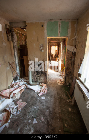 Interior of an old abandoned and rundown apartment Stock Photo