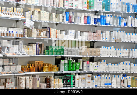 cosmetic and beauty products on display of Pharmacy boutique Lyon Saint Exupery airport Stock Photo