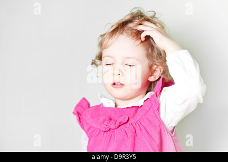 little girl thinking Stock Photo - Alamy