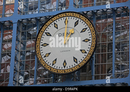 The large main  clock at saint Pancras station in London as viewed from the platforms. Stock Photo