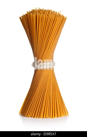 Spaghetti isolated on white background. Bunch of whole wheat pasta tied up by rope Stock Photo
