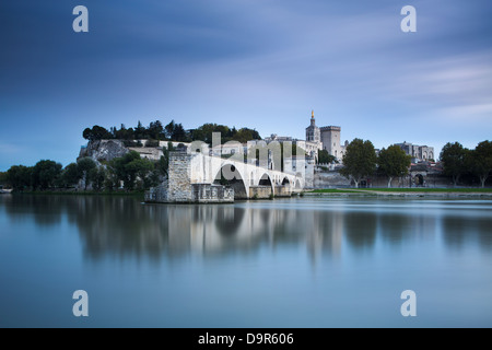 the Pont St-Bénézet, Palais des Papes & Rhone River at dusk, Avignon, Provence, France Stock Photo