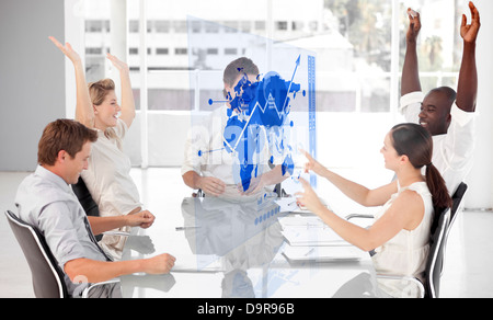 Cheerful business workers using blue map diagram interface Stock Photo