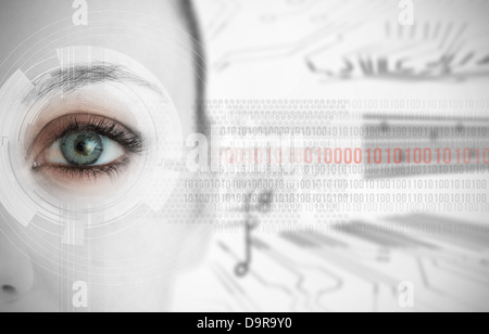 Close up of woman eye with futuristic interface showing binary codes Stock Photo