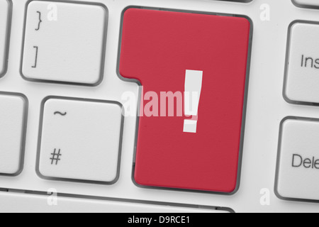 Red exclamation mark button on keyboard Stock Photo
