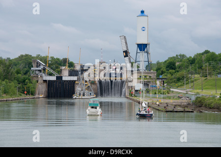 USA, New York / Ontario, Canada. Transiting the Welland Canal, large cargo ship in lock. Stock Photo