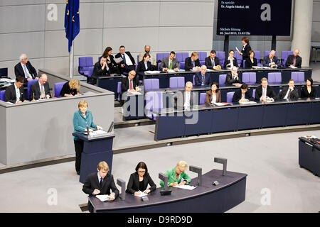 Berlin, Germany. 25th  June, 2013. The Bundestag is holding a special session on 'Helping the victims of the flood misery'. German Chancellor Angela Merkel is giving a government statement on the aids for the vitims of the flood misery providing immediate help and reconstruction. Picture: Angela Merkel (CDU), German Chancellor, at the Bundestag in Berlin. Credit:  Reynaldo Chaib Paganelli/Alamy Live News Stock Photo