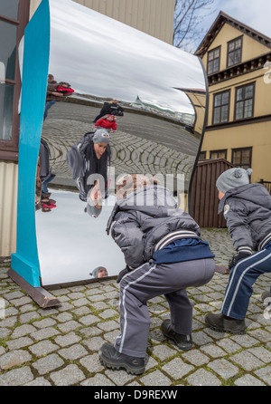 Children looking into fun mirror, Children's Cultural Festival, Reykjavik Iceland. Stock Photo