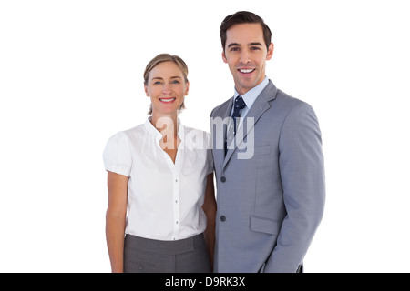 Smiling co workers standing together Stock Photo