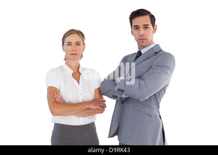Serious co workers standing together Stock Photo