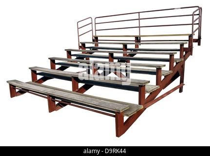 Empty bleachers or stands isolated on a white background as a symbol of school sports and fan support for small town sporting events. Stock Photo