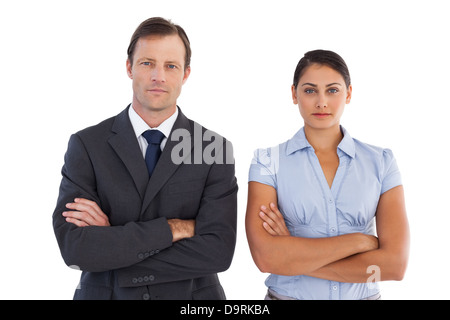 Co workers standing next to each other Stock Photo