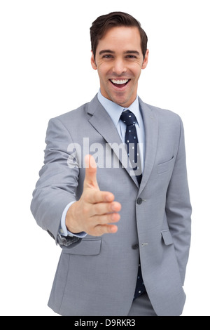 Attractive businessman giving a helping hand Stock Photo