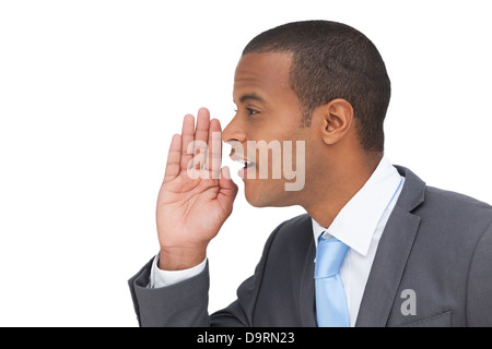 Profile view of a businessman calling for someone Stock Photo