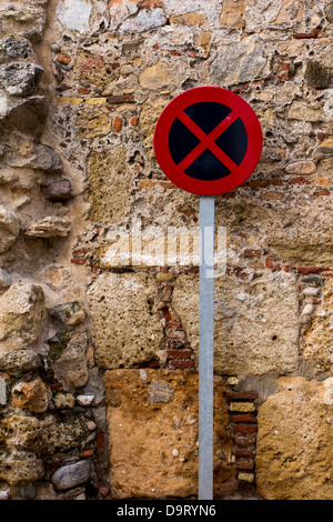 SPANISH STREET SIGN FOR NO PARKING IN THE OLD TOWN MARBELLA SPAIN Stock Photo