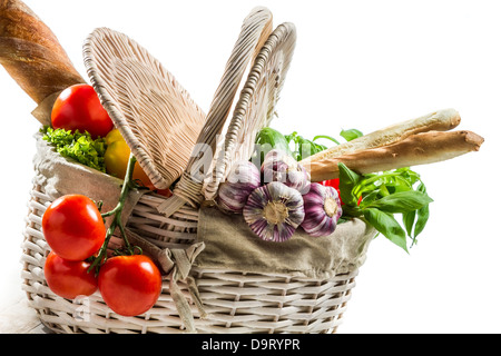 Spring basket full of fresh vegetables Stock Photo