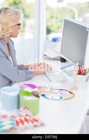 Interior designer working on her computer Stock Photo