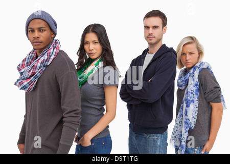 Stylish young people in a row Stock Photo