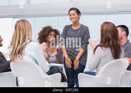 Patient has a breakthrough in group therapy Stock Photo