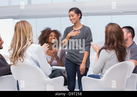 Happy patient has a breakthrough in group therapy Stock Photo