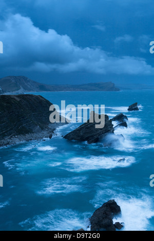 Mupe Bay at dawn on a rough winter morning, Jurassic Coast, Dorset, England, UK