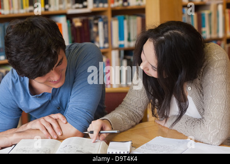 Two students learning in a library Stock Photo