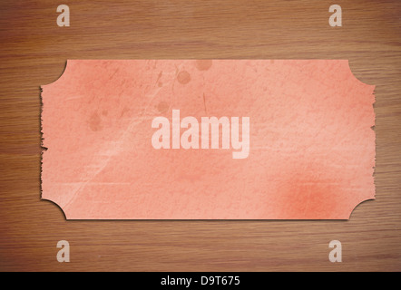 Piece of paper on wooden desk Stock Photo