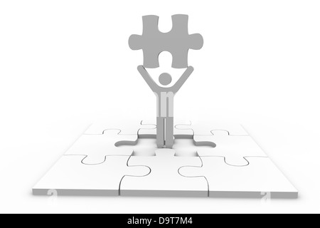 Human representation holding jigsaw piece over unfinished puzzle Stock Photo