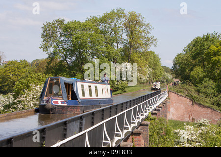 Narrowboat crossing Edstone aqueduct on the Stratford upon Avon Canal near Henley in Arden, Warwickshire, England, UK Stock Photo