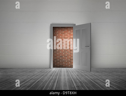 Door open to reveal red brick wall blocking the way Stock Photo